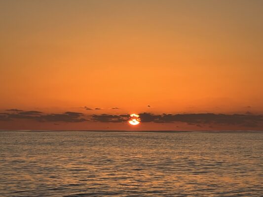 sunset while Hitchhiking across the Atlantic
