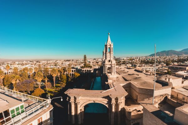 Aerial drone view of Arequipa main square and cathedral church at sunset. Arequipa, Peru. Aerial drone view of Arequipa main square and cathedral church, with the Misti volcano as background.